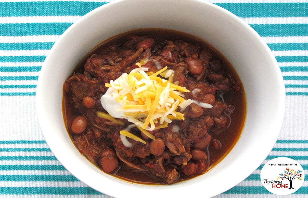 Slow Cooker Steak Chili in a bowl.  Recipe calls for 14 ingredients, 360 minutes cooking time, 5 minutes prep time, and 6 servings.