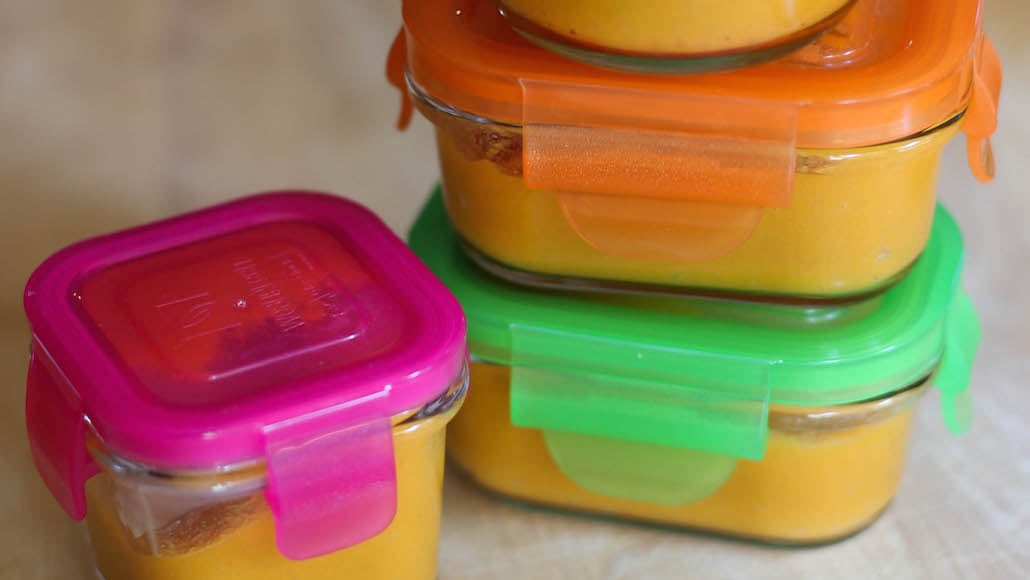 Glass containers filled with Sweet Potato Apple Mash Baby Food.  Recipe calls for 2 ingredients, 60 minutes cooking time, 10 minutes prep time, and 4 servings.