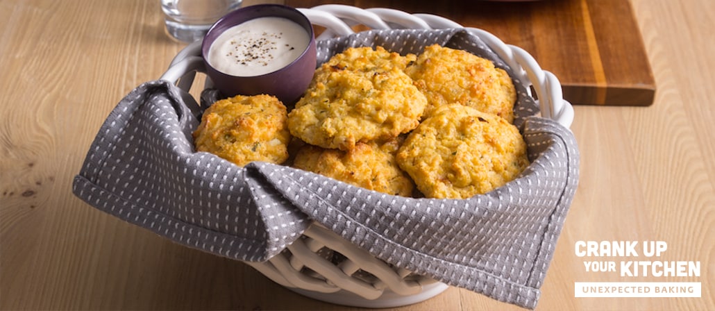Drop Biscuits with a Spicy Parmesan Aioli.  Recipe calls for 18 ingredients, 25 minutes cooking time, 10 minutes prep time, and 8 servings.